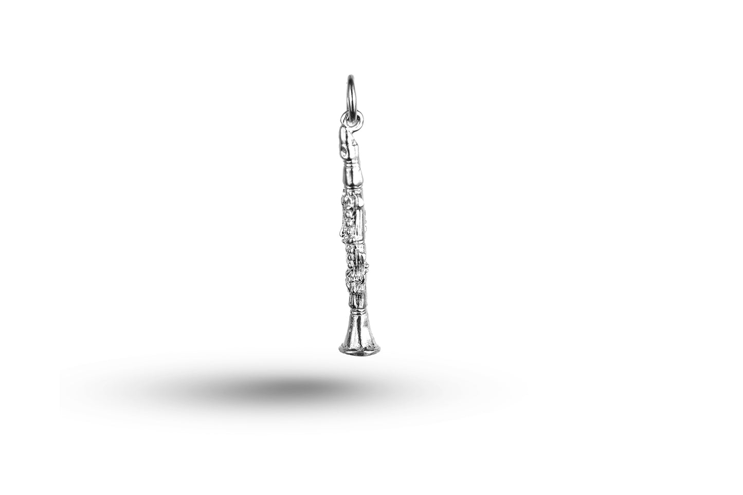 White gold Clarinet charm.