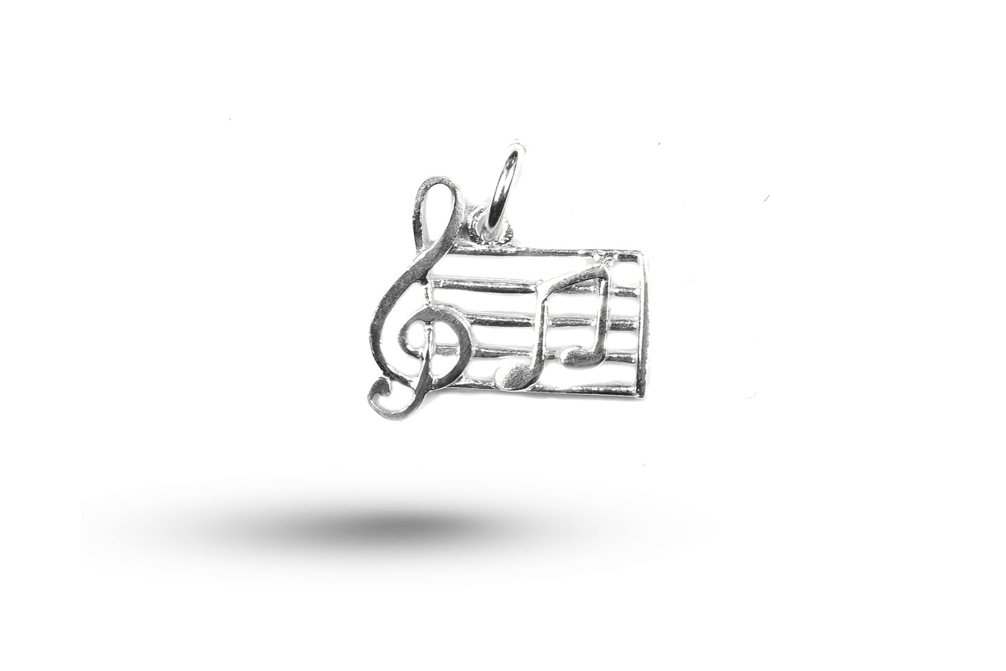 White gold Treble Clef With Notes charm.