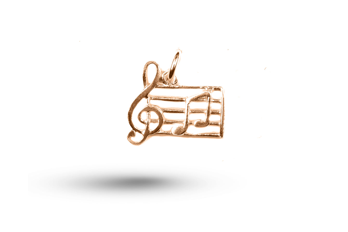 Rose gold Treble Clef With Notes charm.