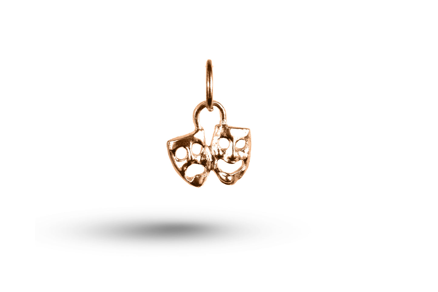 Rose gold Drama Masks charm.