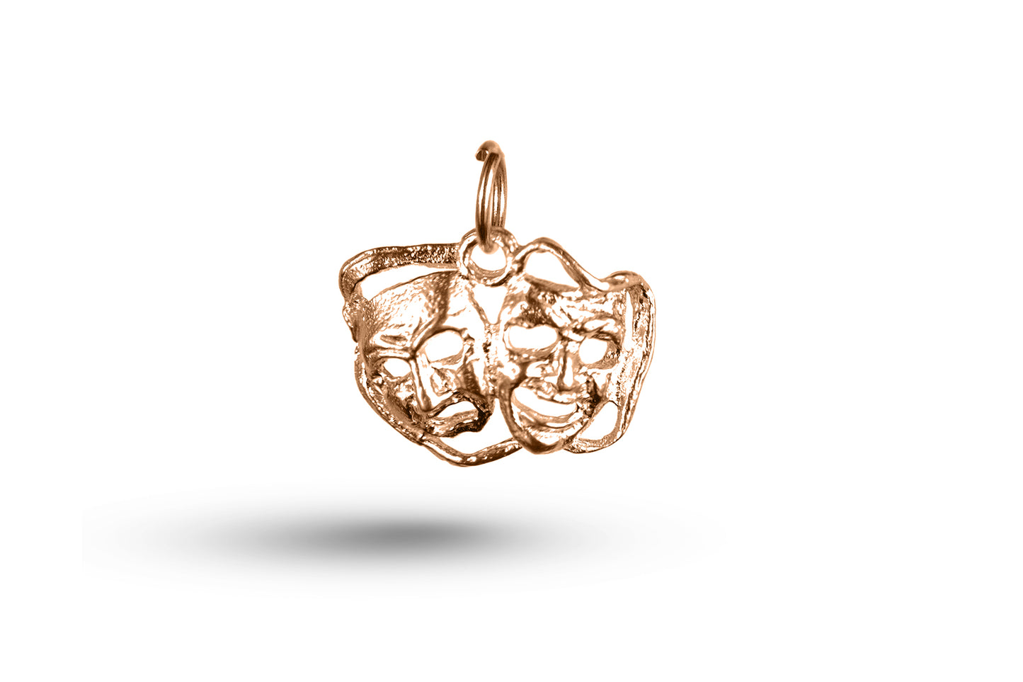 Rose gold Drama Masks charm.