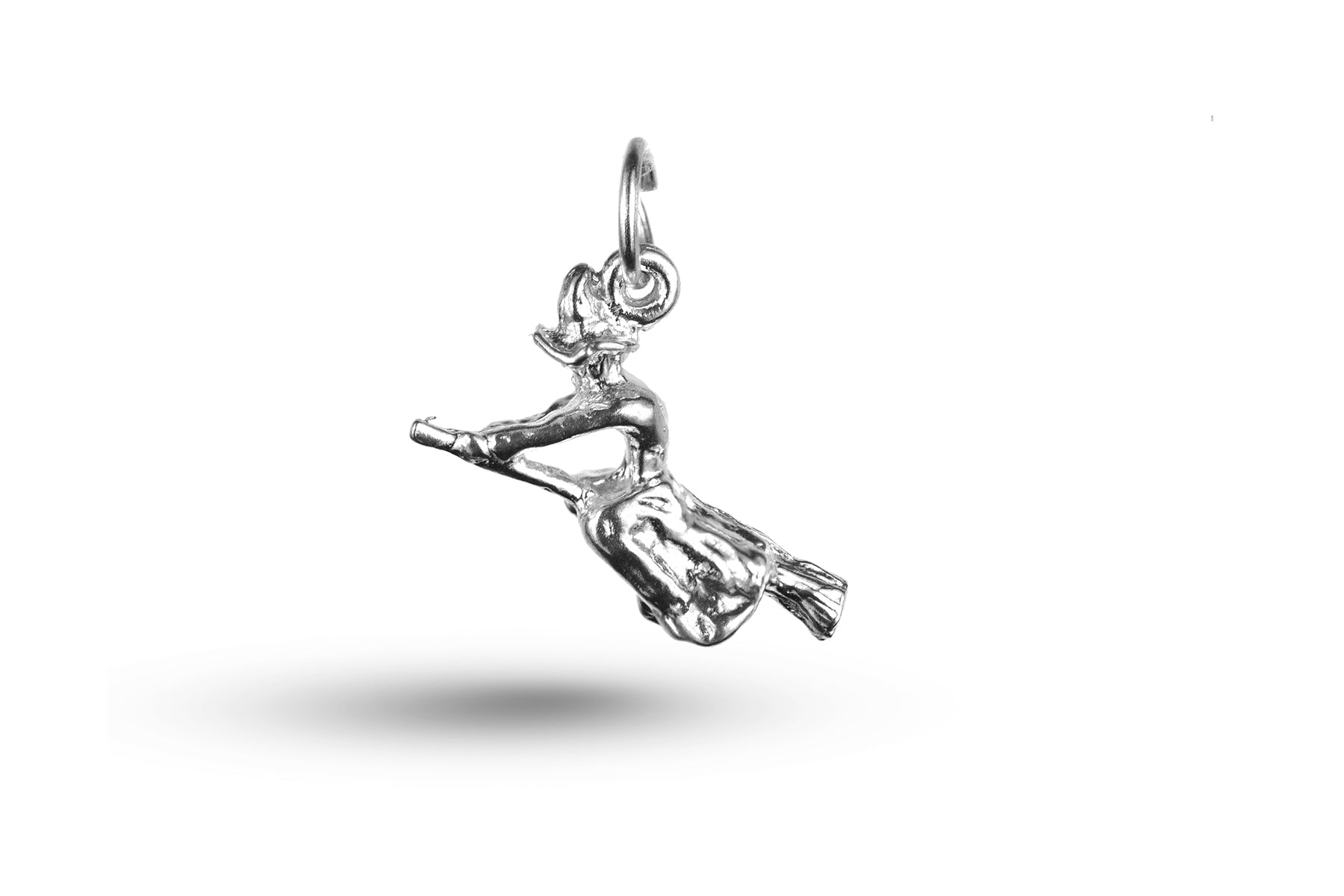 White gold Witch on Broom charm.