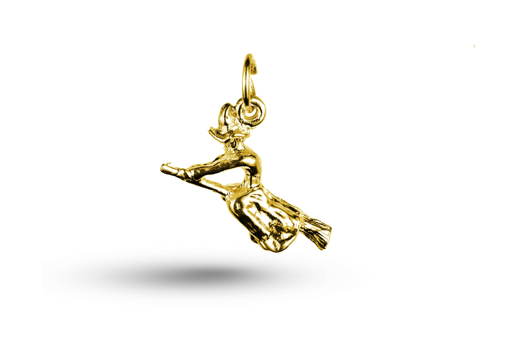 Yellow gold Witch on Broom charm.