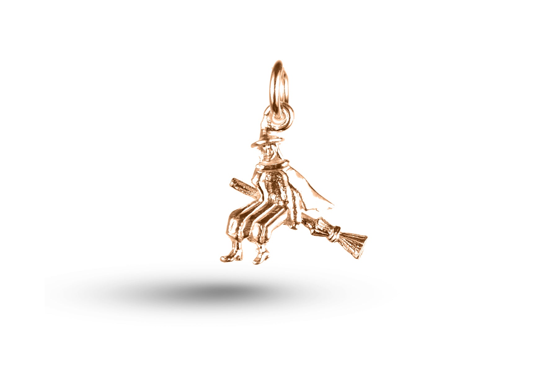 Rose gold Witch on Broom charm.