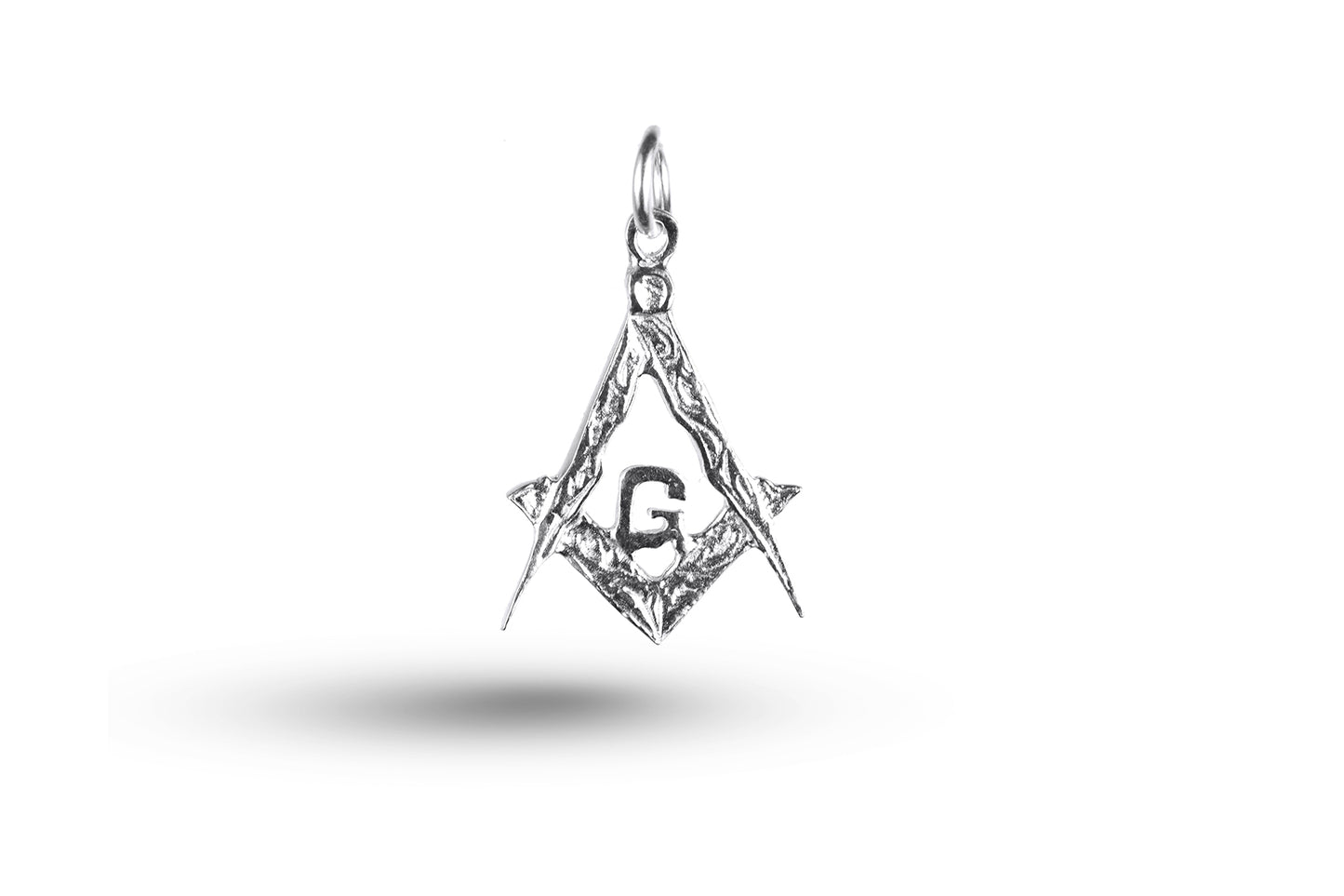 White gold Masonic charm.