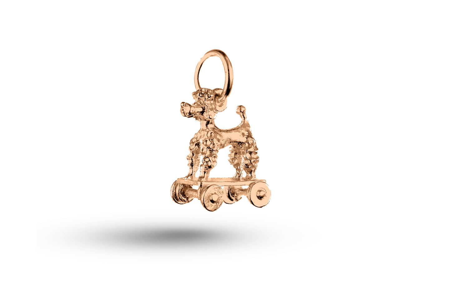 Rose gold Poodle on Wheels Dog charm.