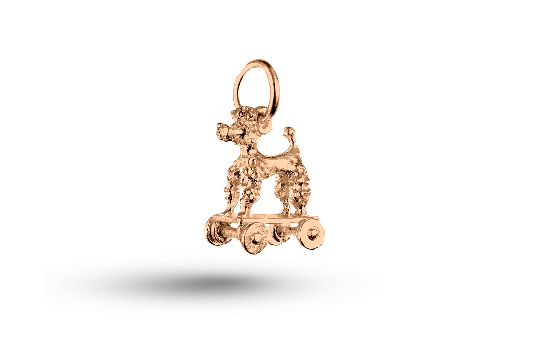 Rose gold Poodle on Wheels Dog charm.