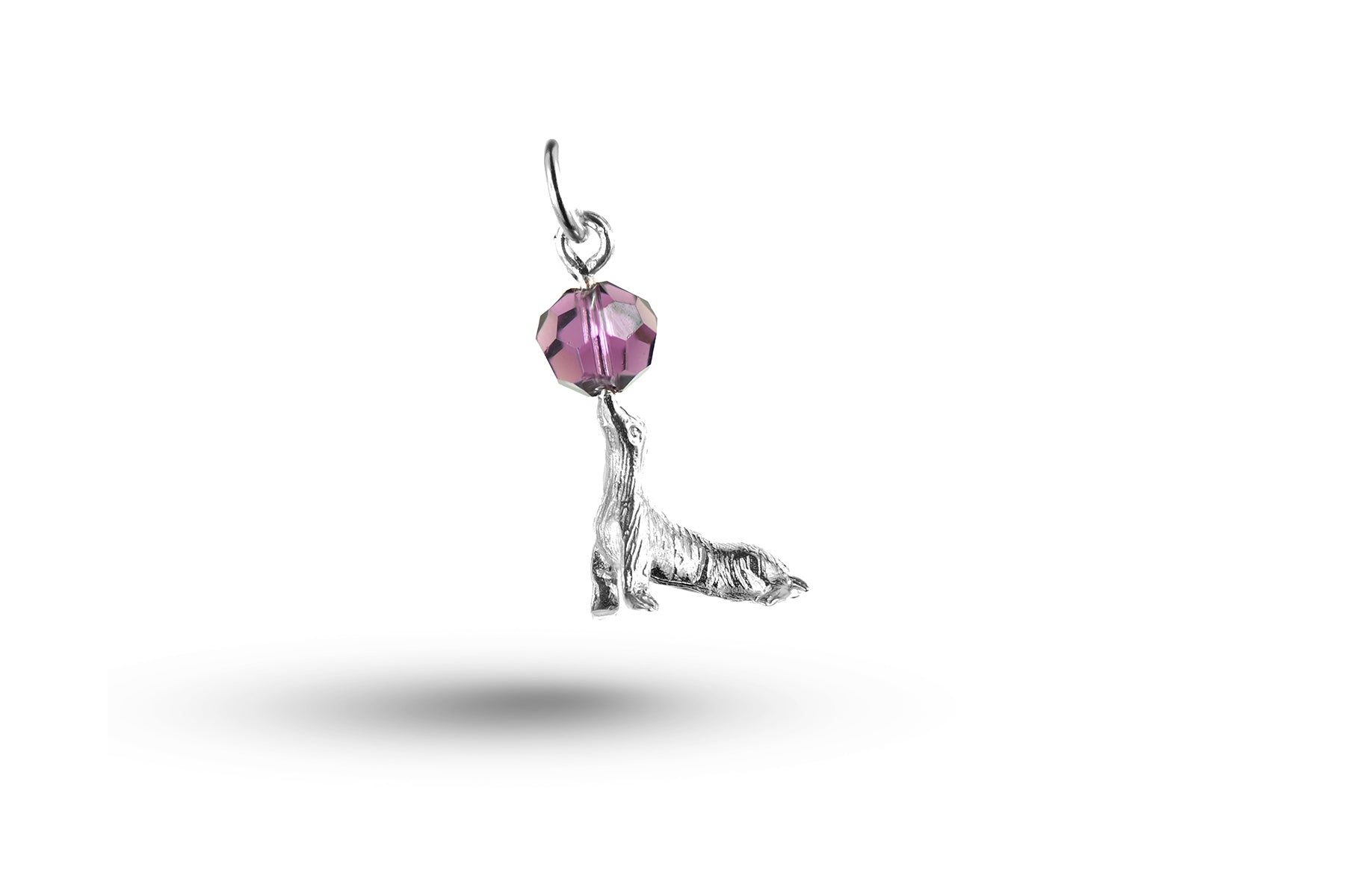 White gold Sealion and Stone charm.