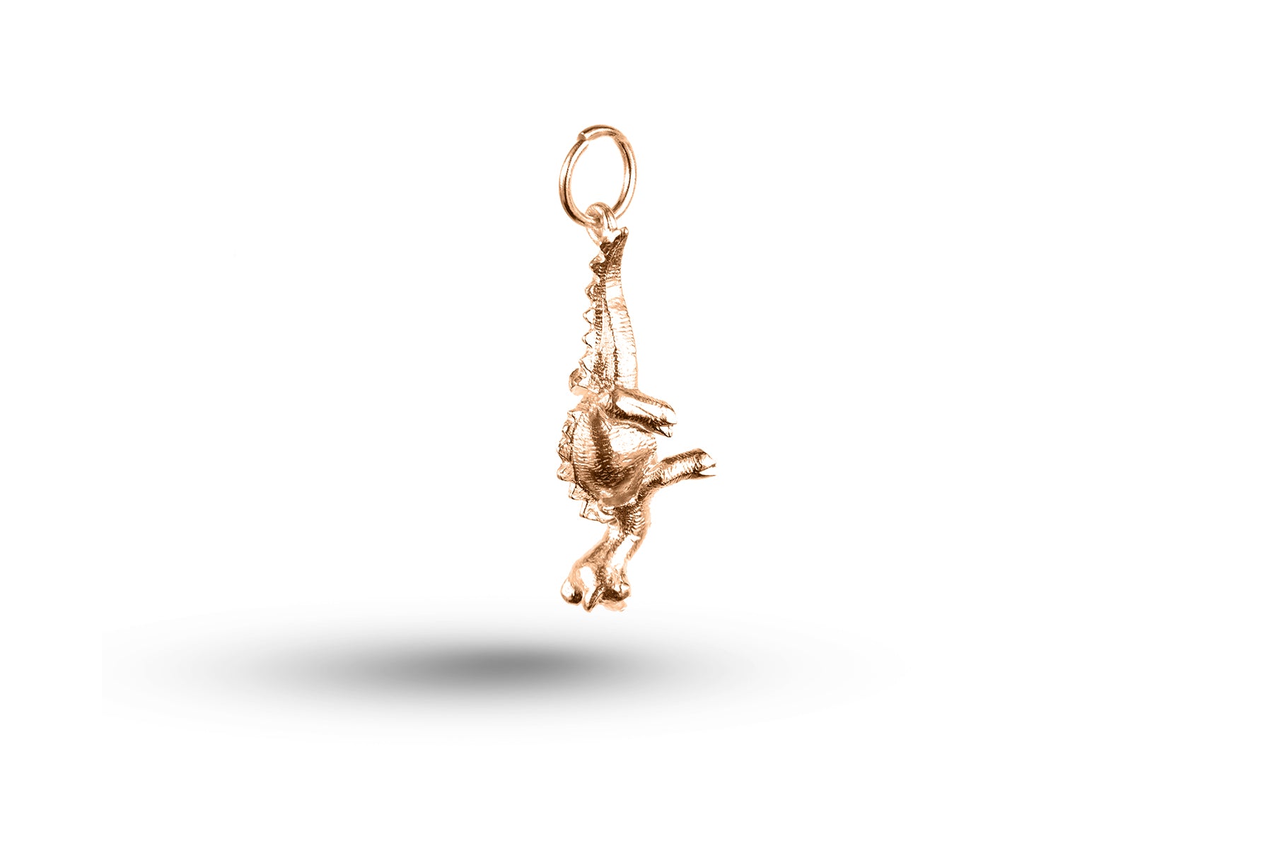 Rose gold Dinosaur charm.