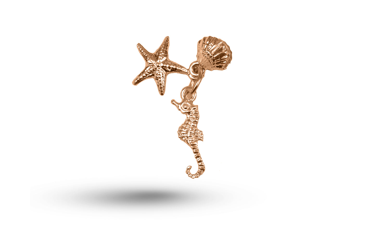 Rose gold Seahorse Starfish Shell charm.