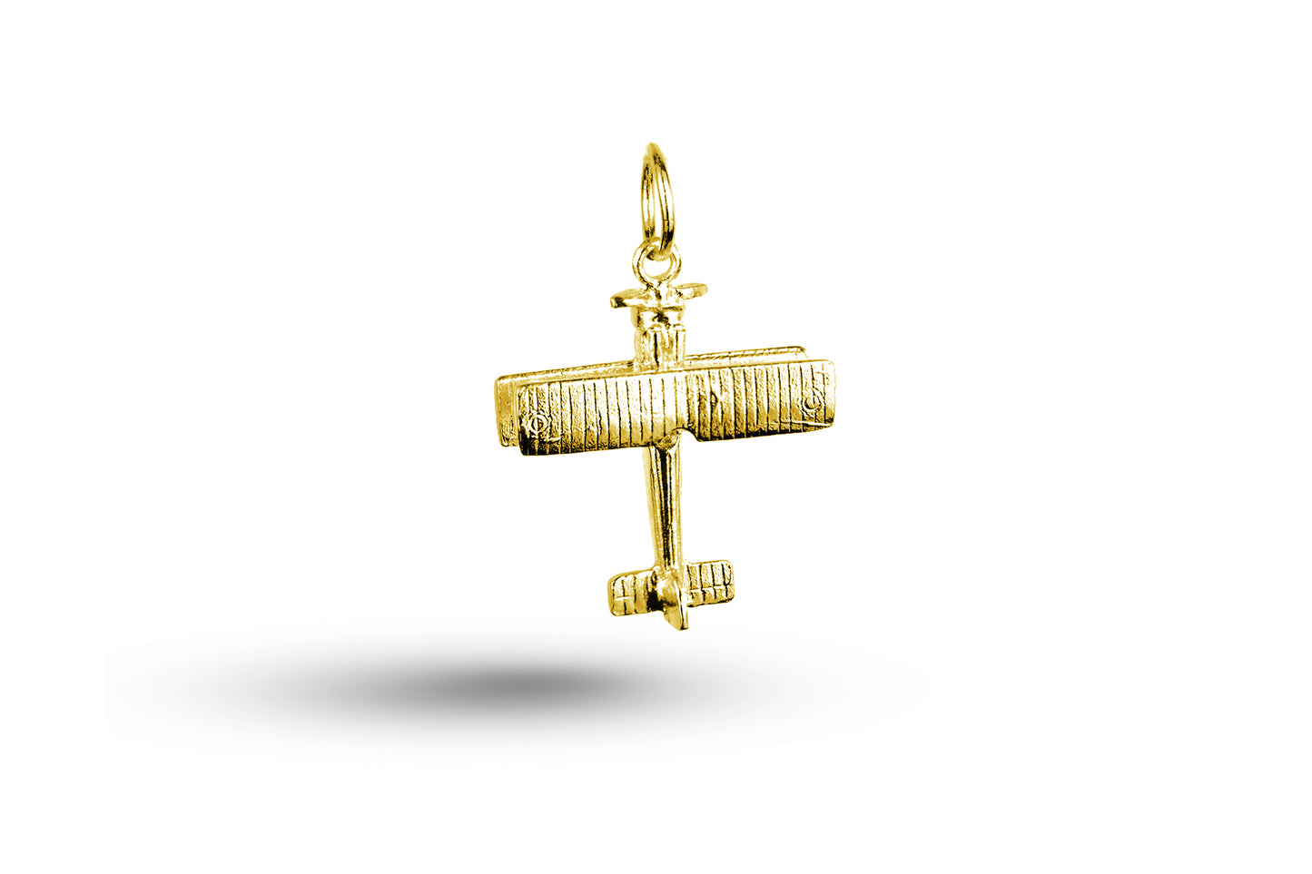 Yellow gold Bi-Plane charm.