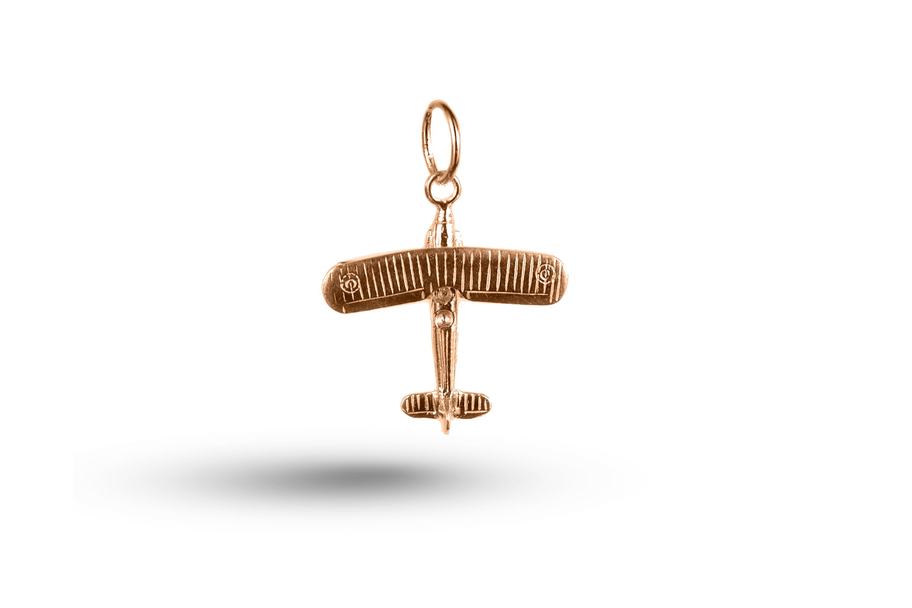 Luxury rose gold bi-plane charm.