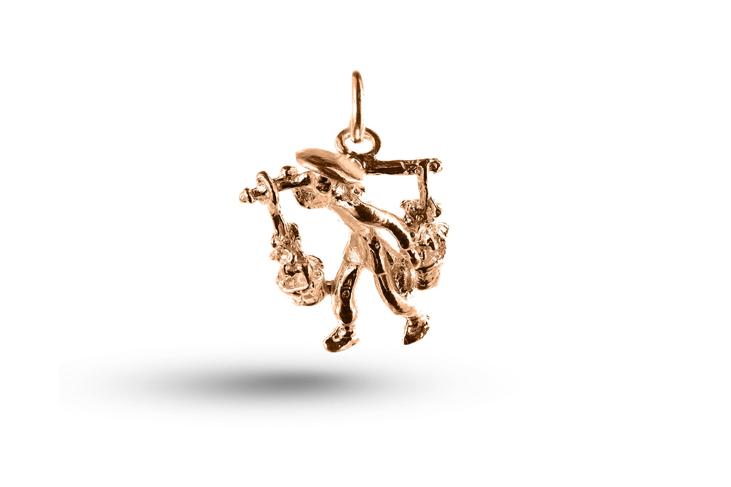 Rose gold Farmer charm.