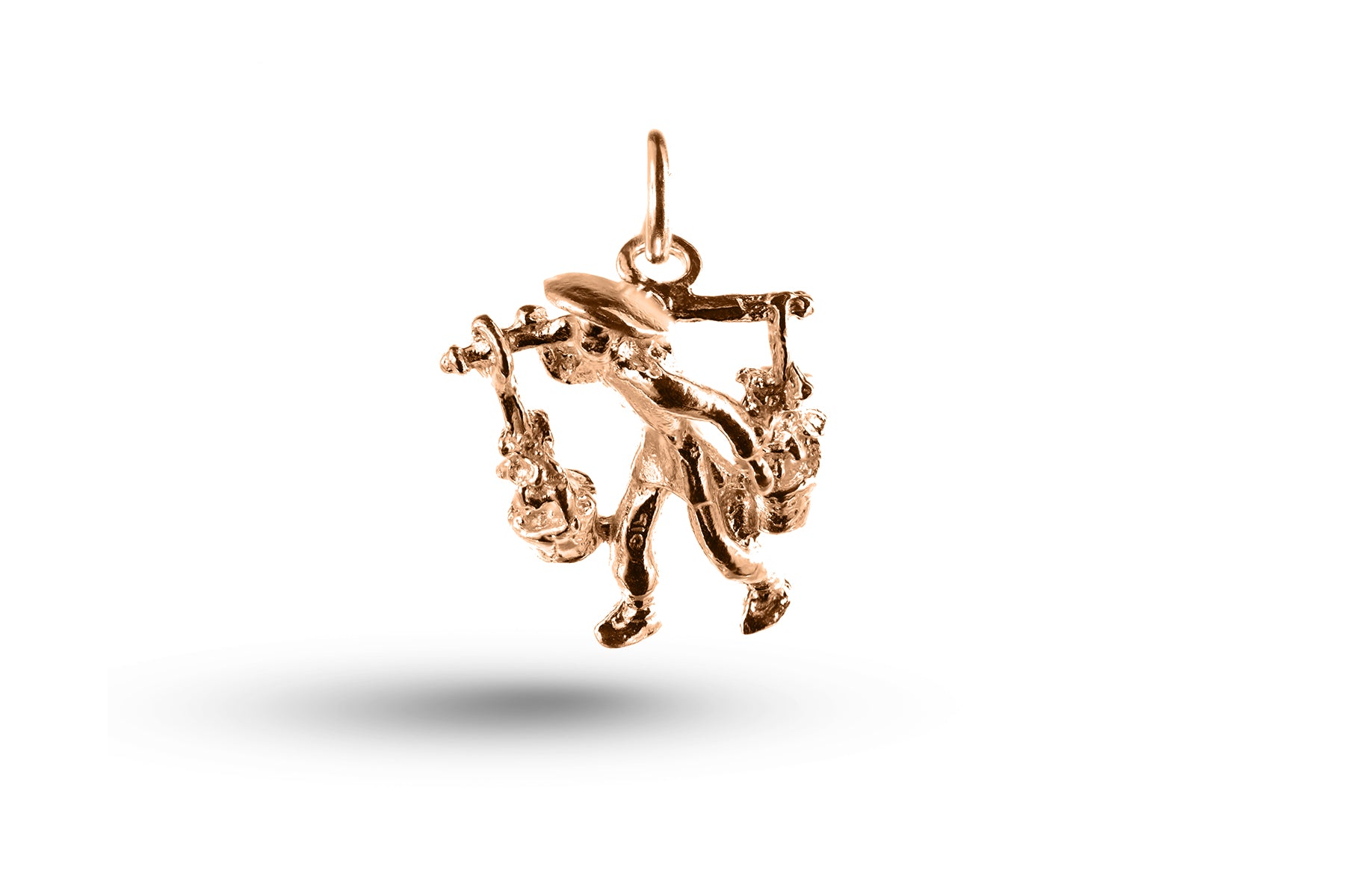Rose gold Farmer charm.
