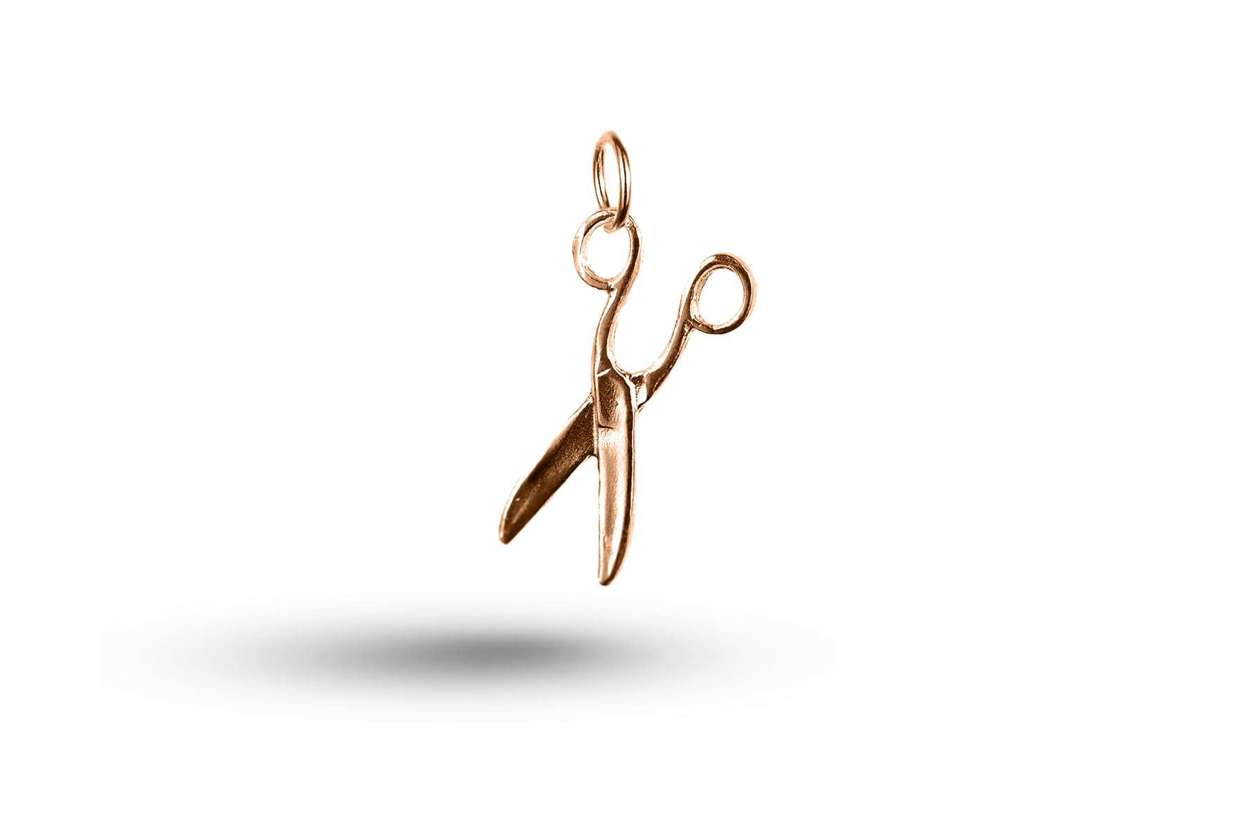Rose gold Scissors charm.