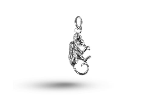 White gold Monkey Eating Banana charm.