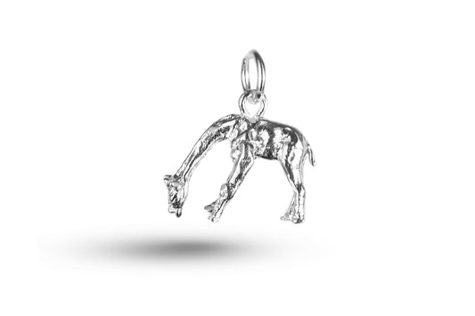 White gold Grazing Giraffe charm.