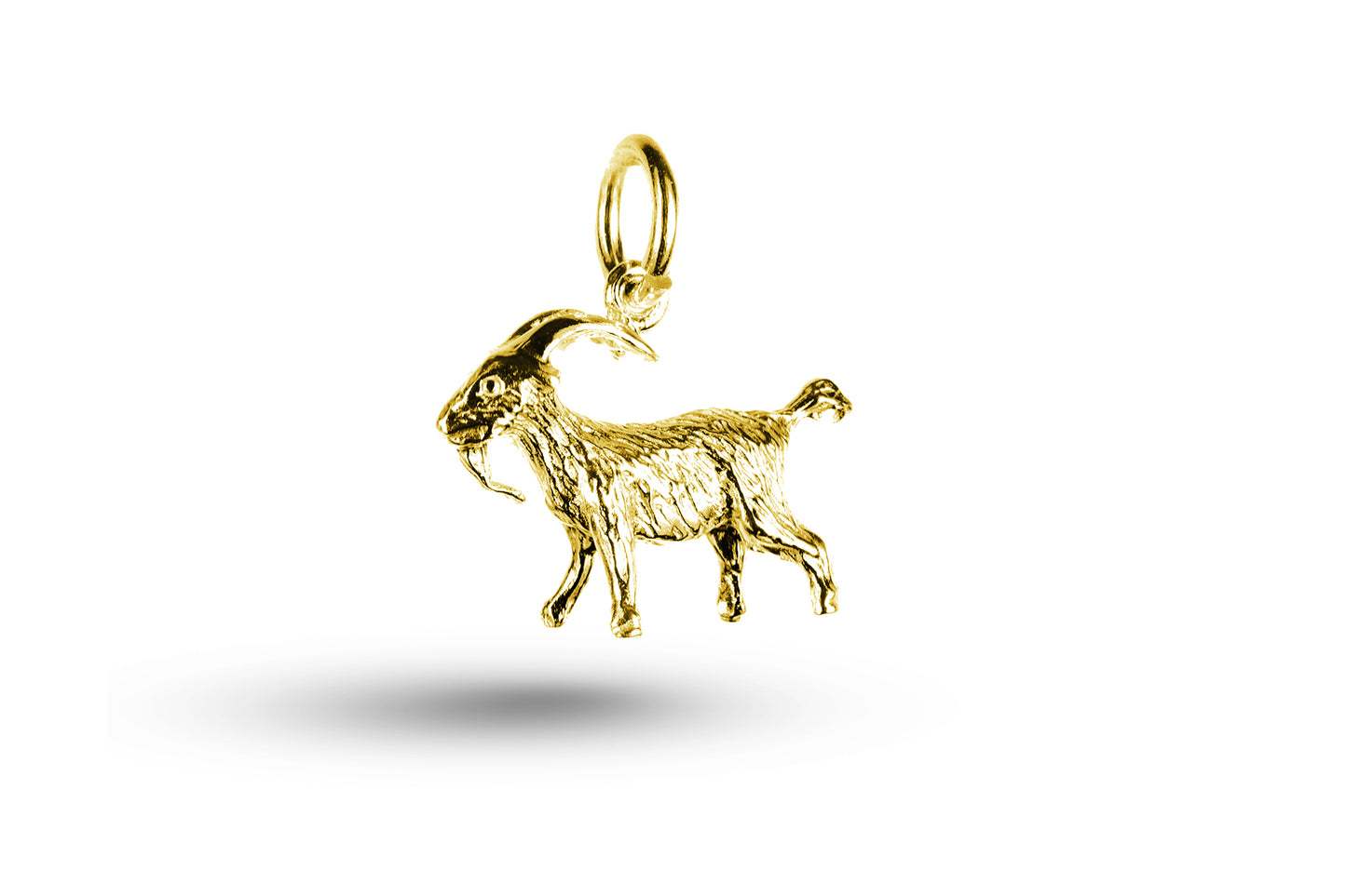Yellow gold Goat charm.