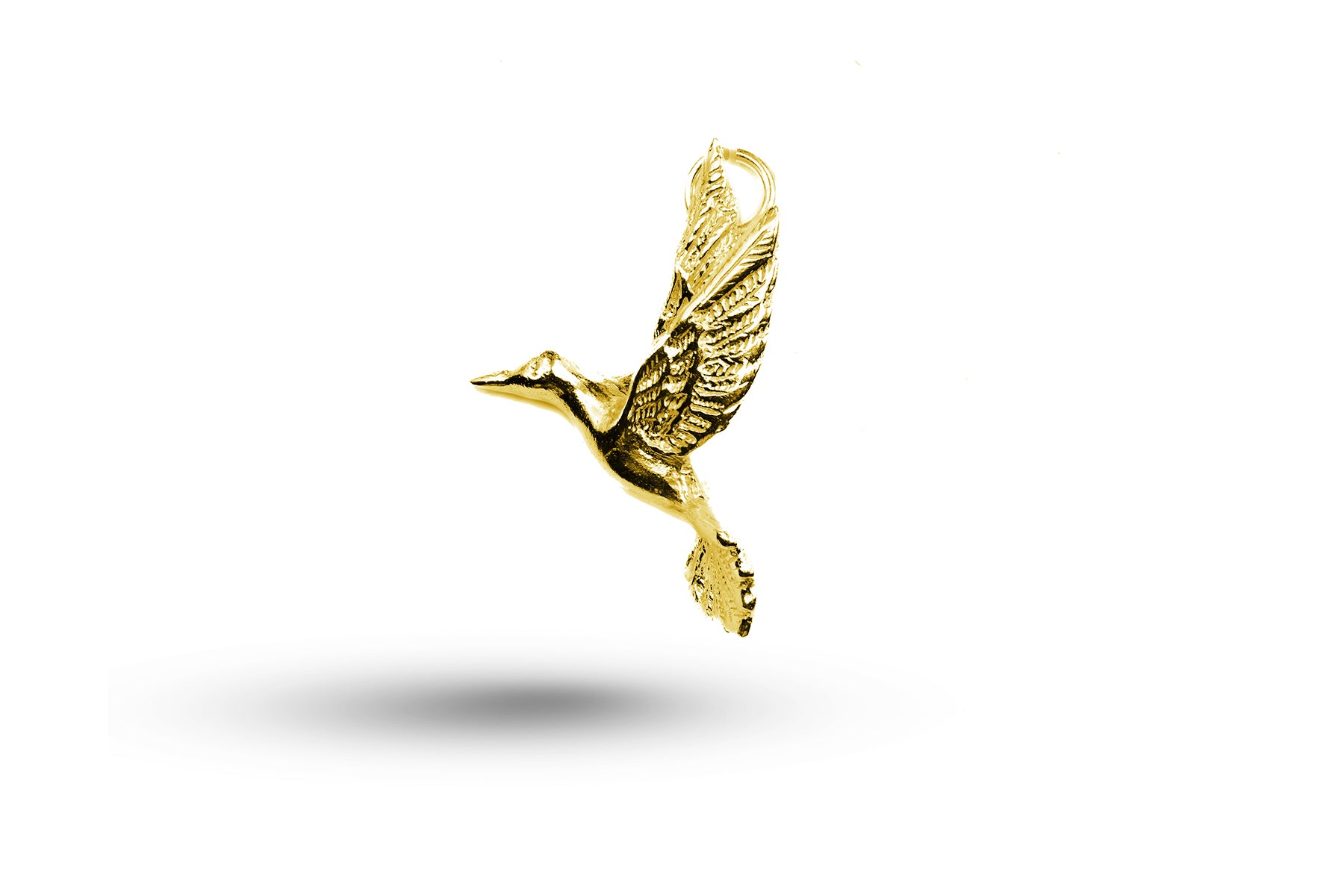 Yellow gold Humming Bird charm.