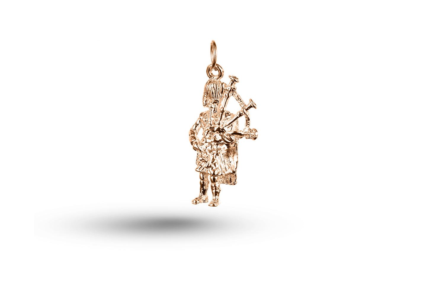 Rose gold Scottish Piper charm.