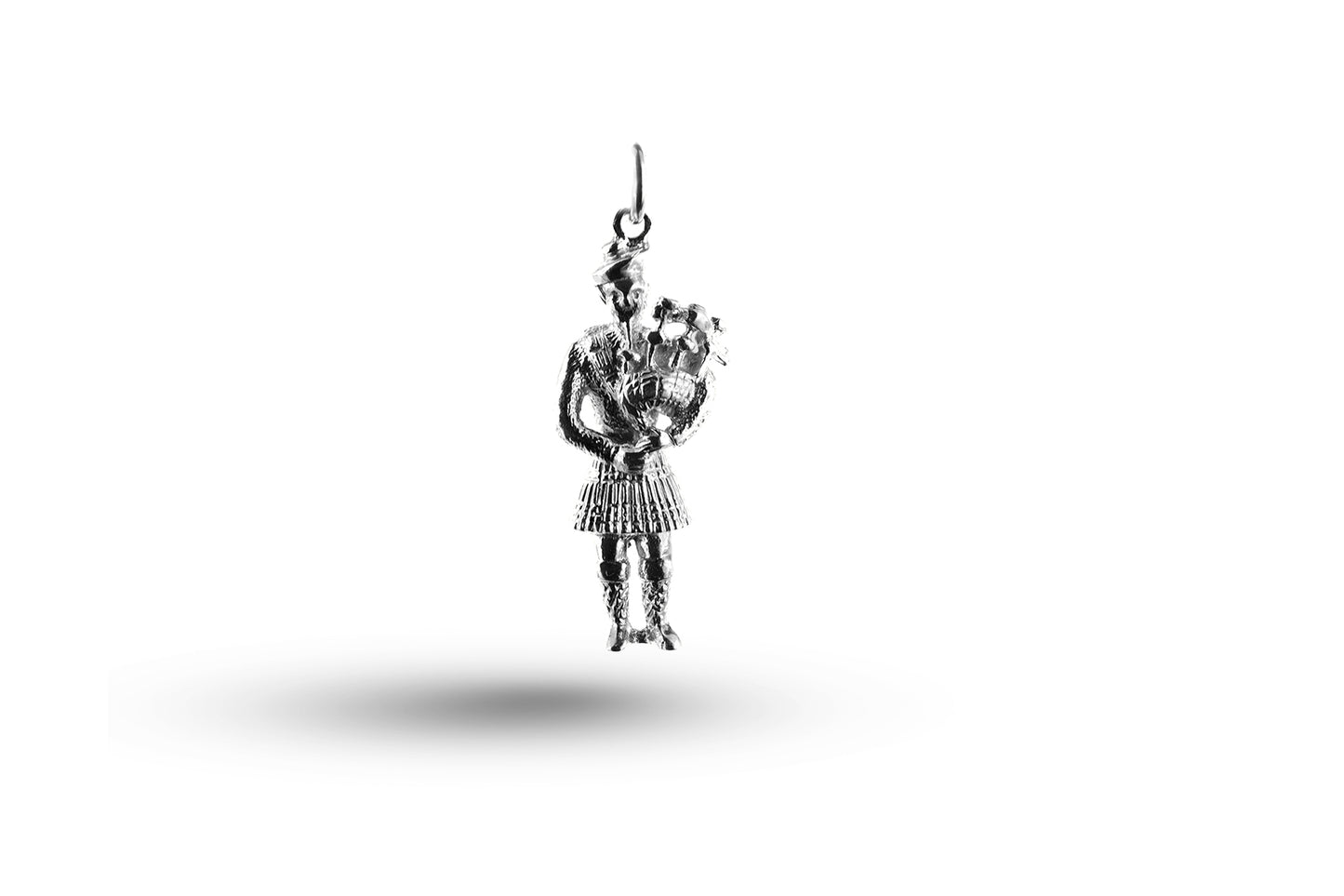 White gold Scottish Piper charm.
