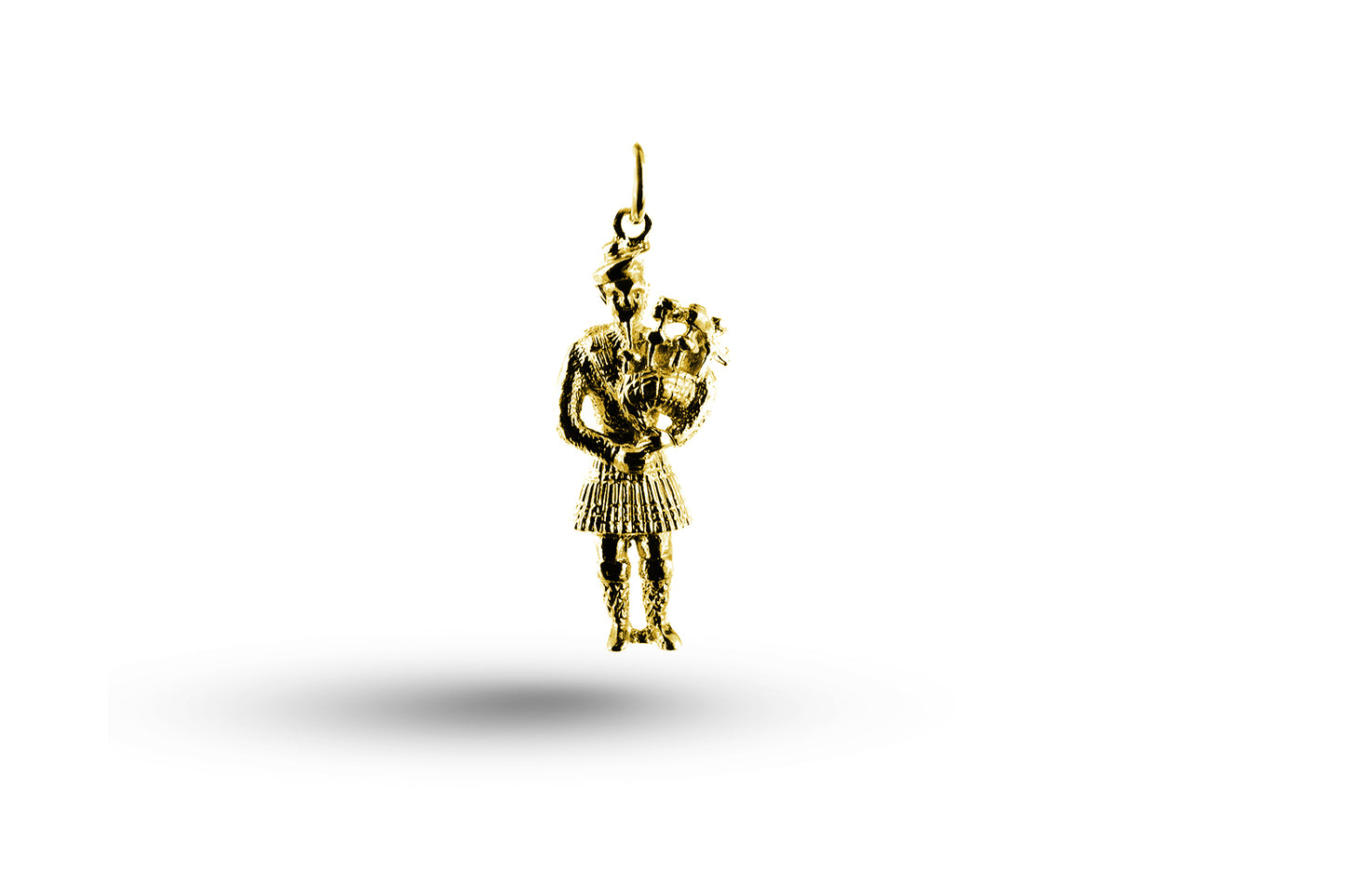 Yellow gold Scottish Piper charm.