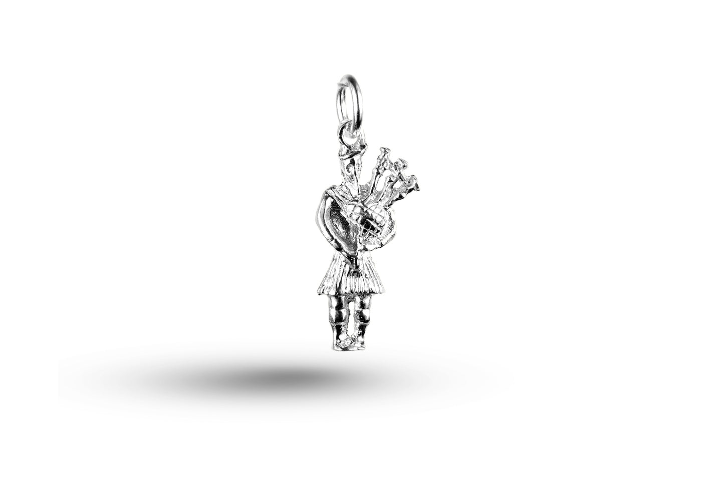 White gold Scottish Piper charm.