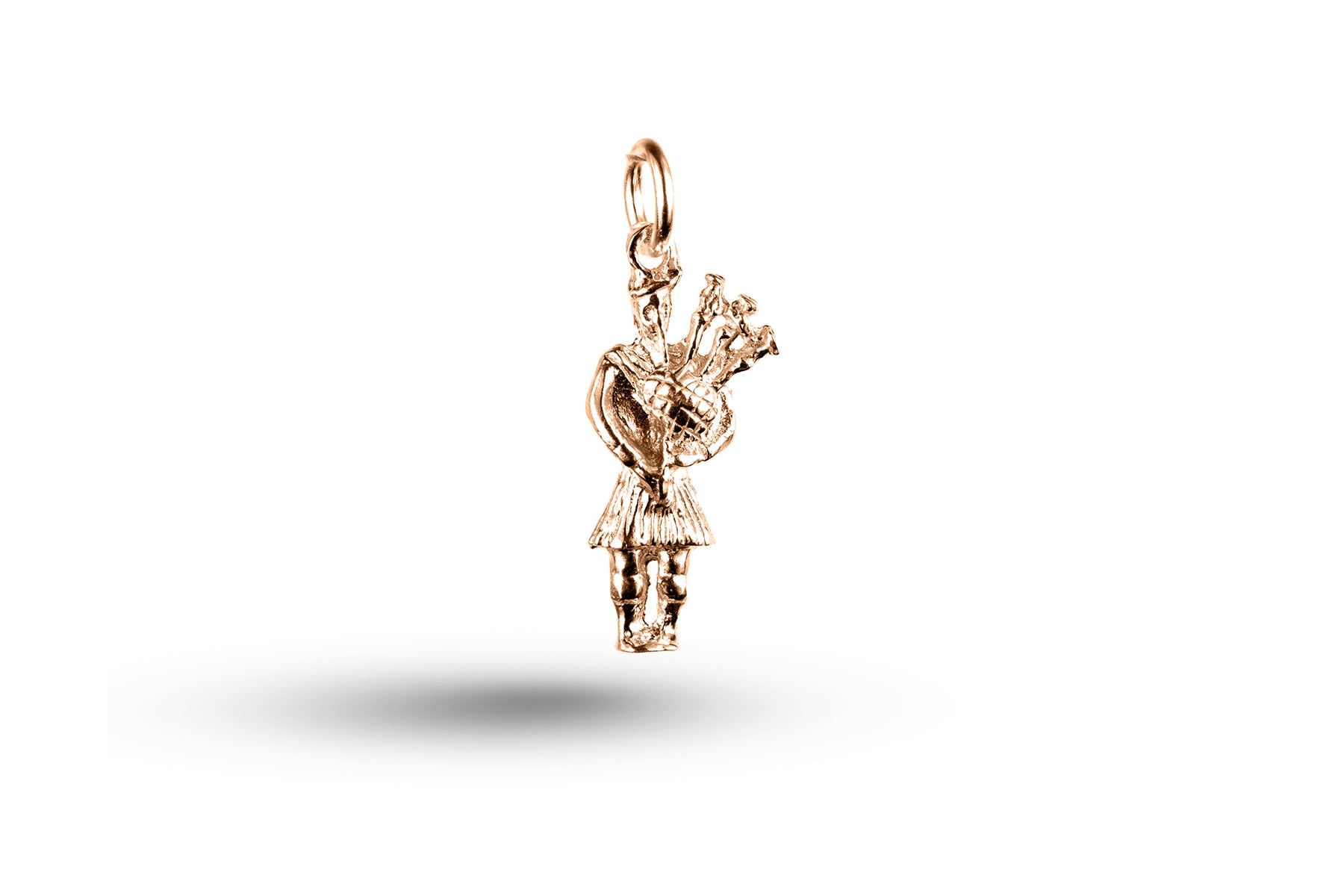 Rose gold Scottish Piper charm.