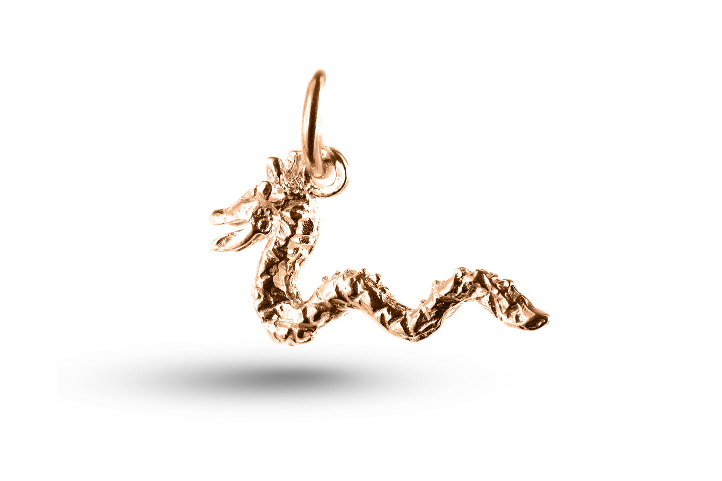 Rose gold Loch Ness Monster charm.