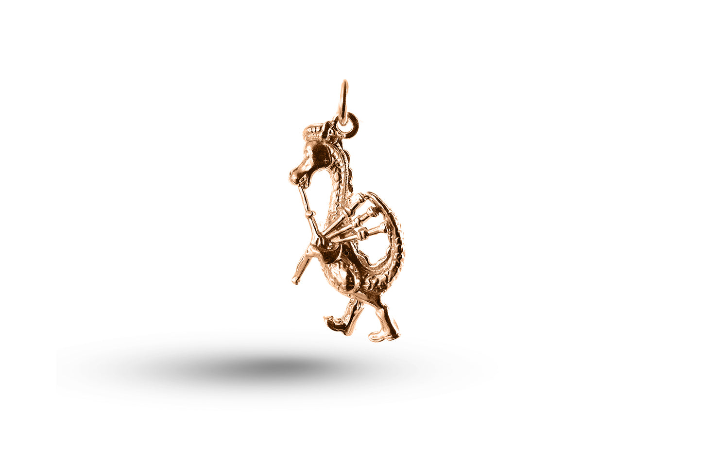 Rose gold Loch Ness Monster with Bagpipes charm.