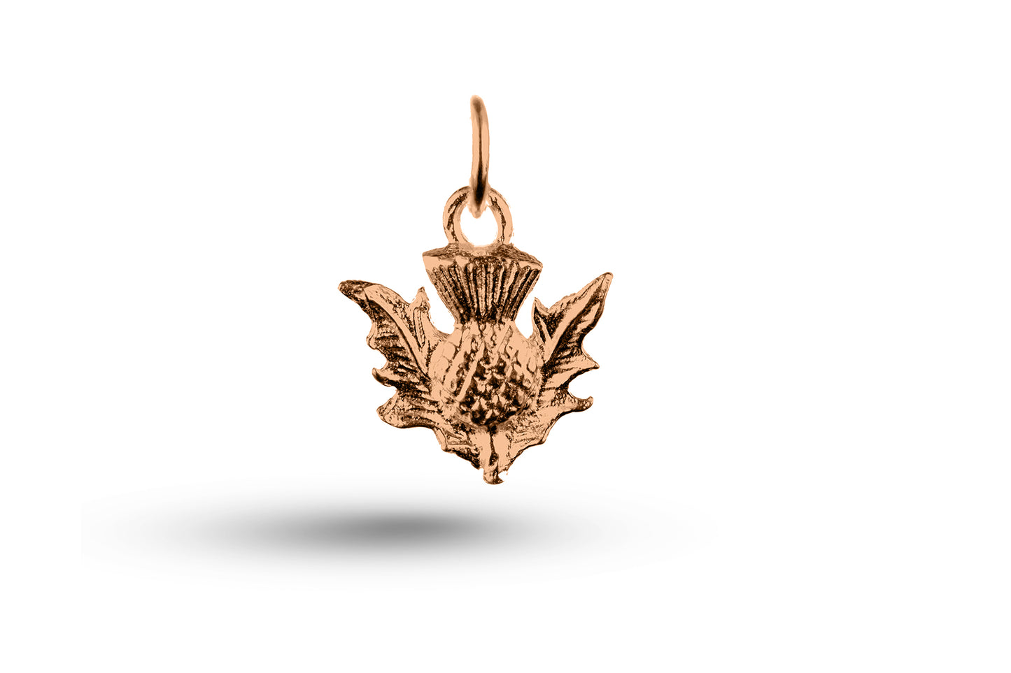 Rose gold Thistle charm.