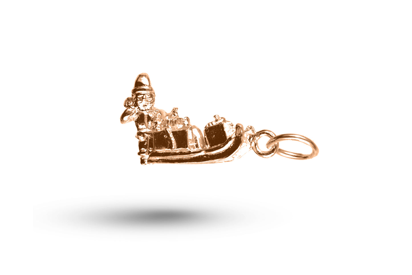 Rose gold Father Christmas on Sleigh charm.