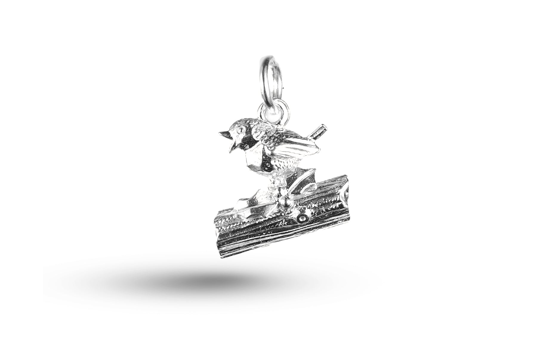 White gold Robin on Log Christmas charm.