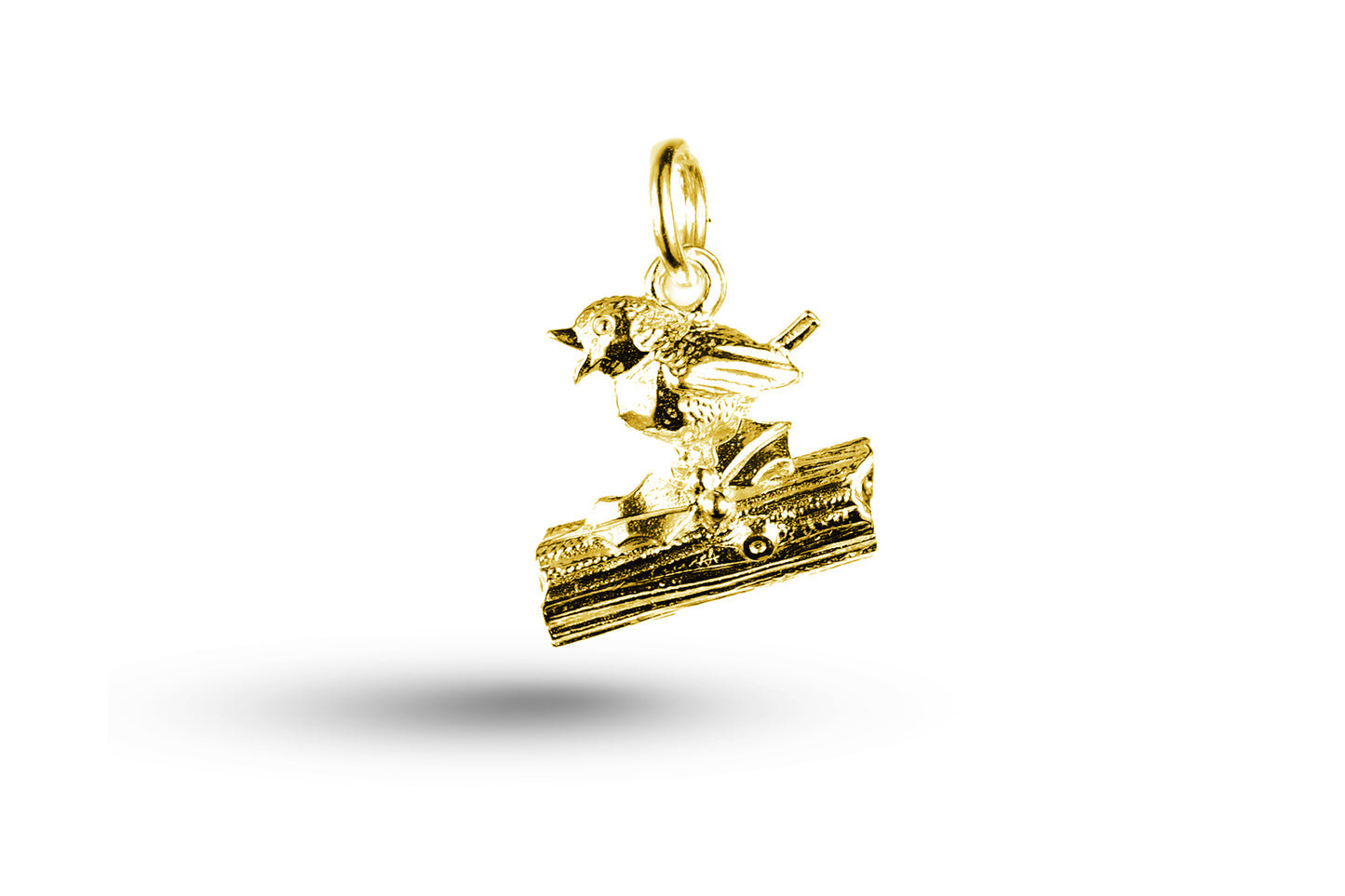 Yellow gold Robin on Log Christmas charm.