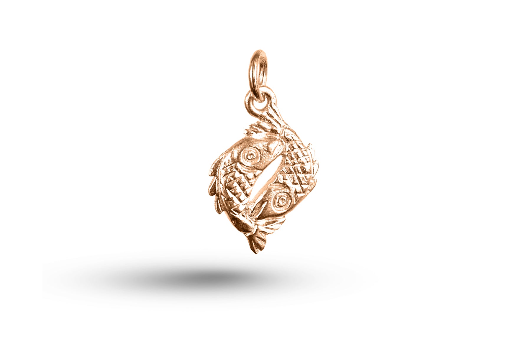 Rose gold Pisces charm.