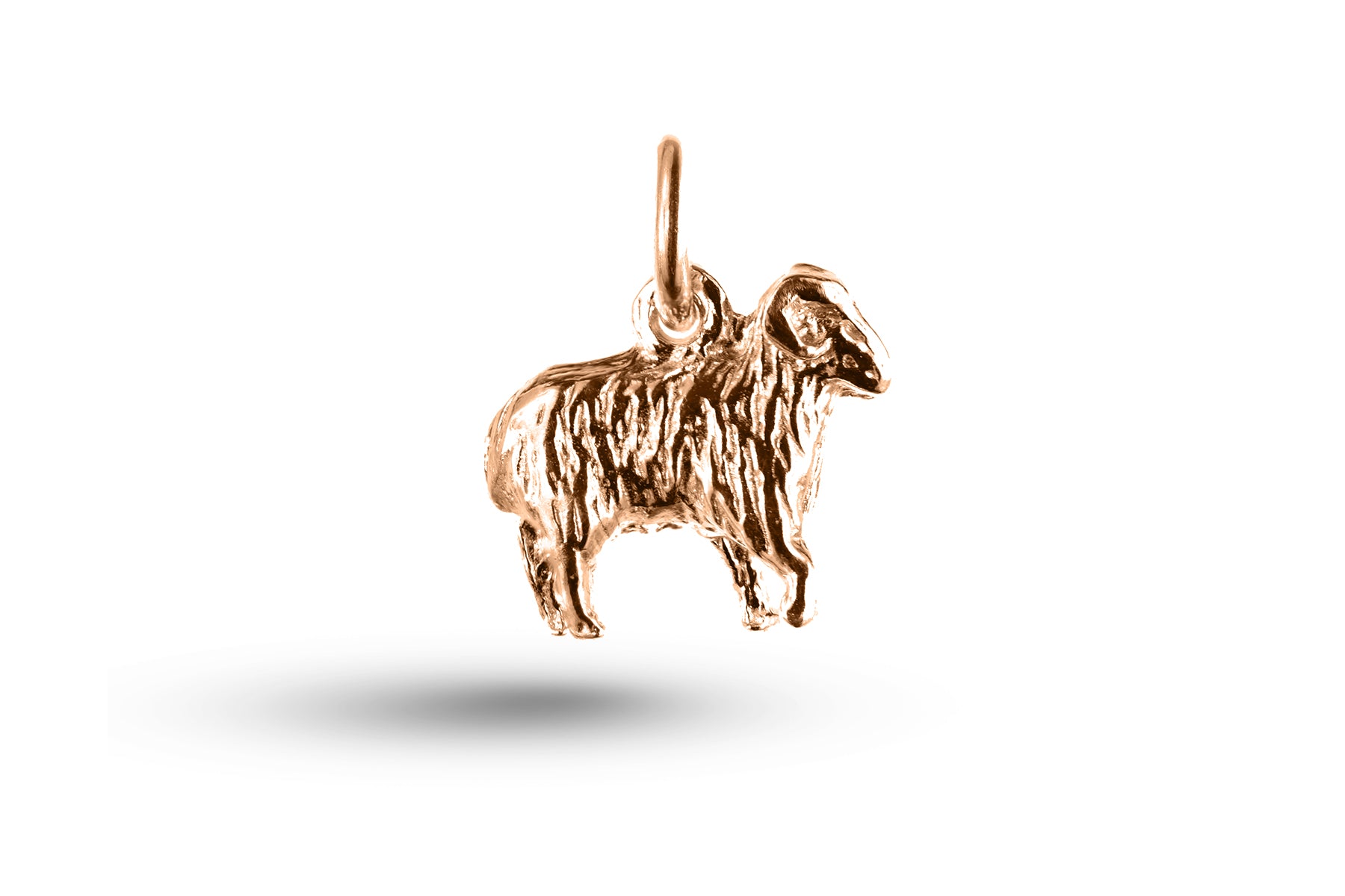 Rose gold Ram charm.