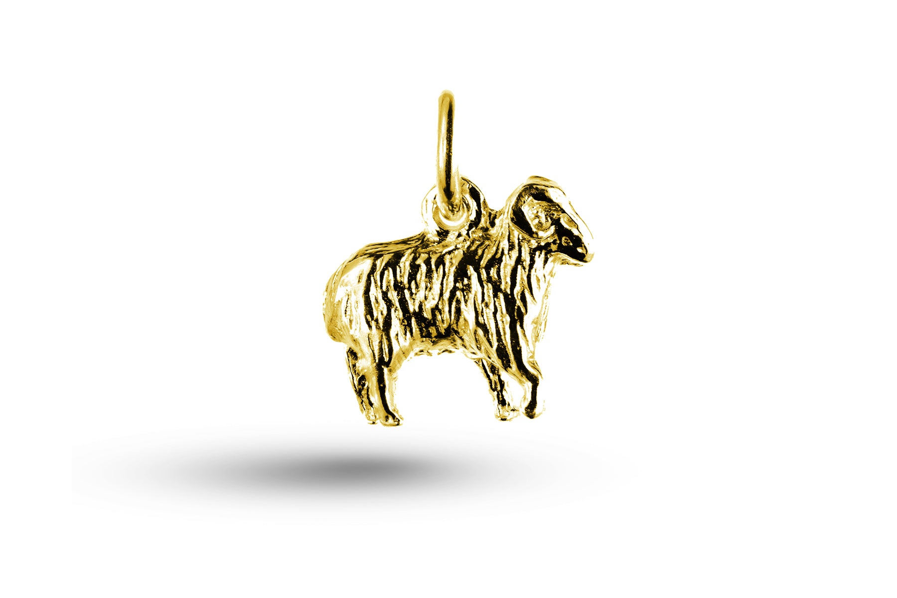 Yellow gold Ram charm.