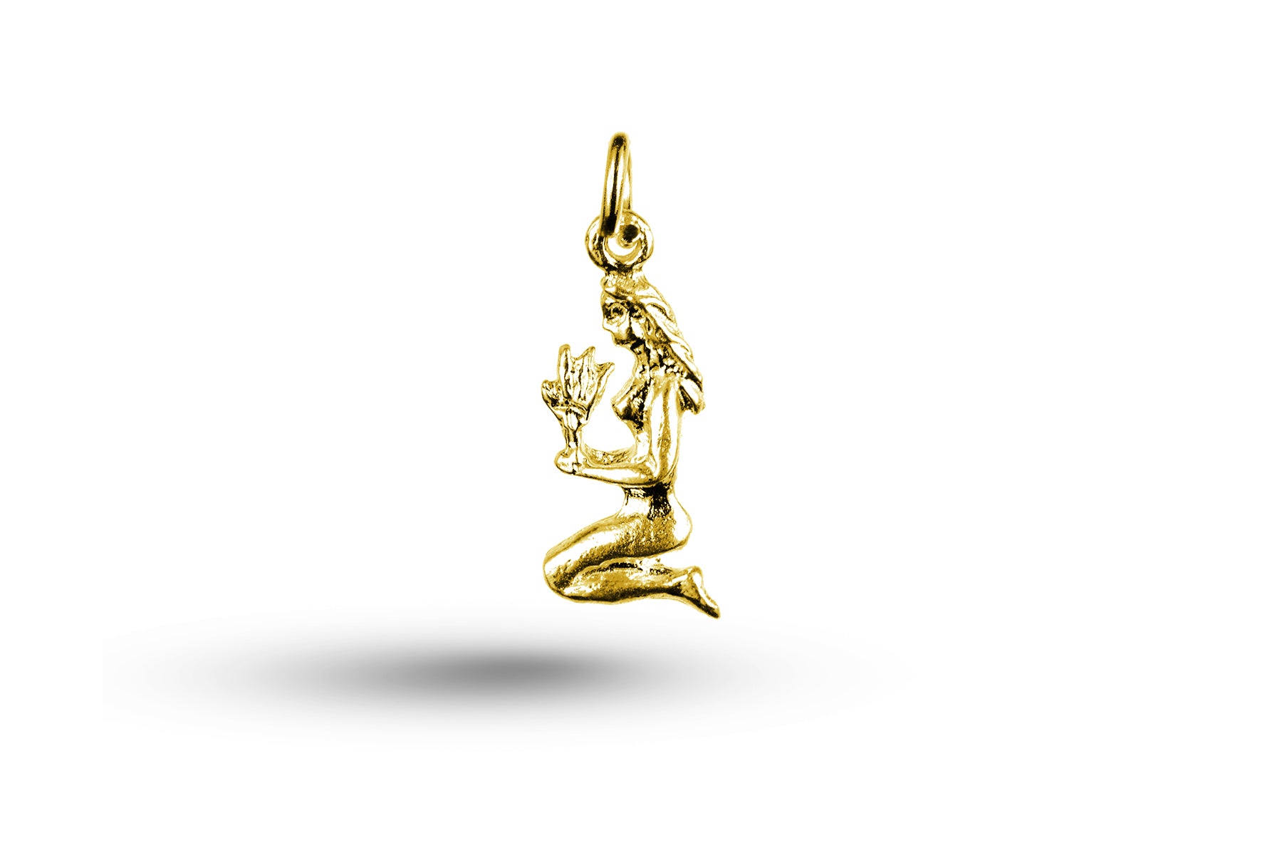Yellow gold Virgo charm.