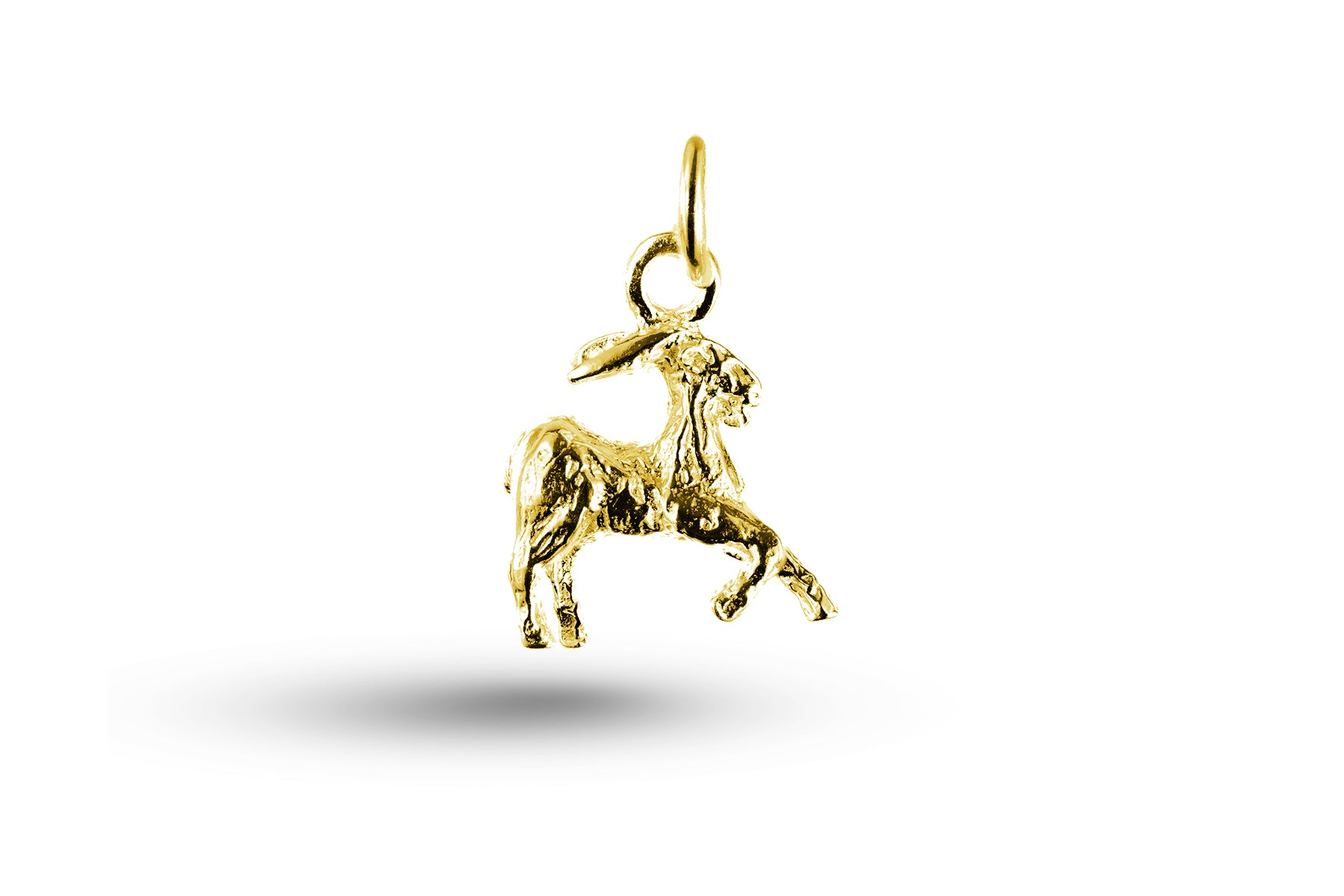 Yellow gold Goat charm.