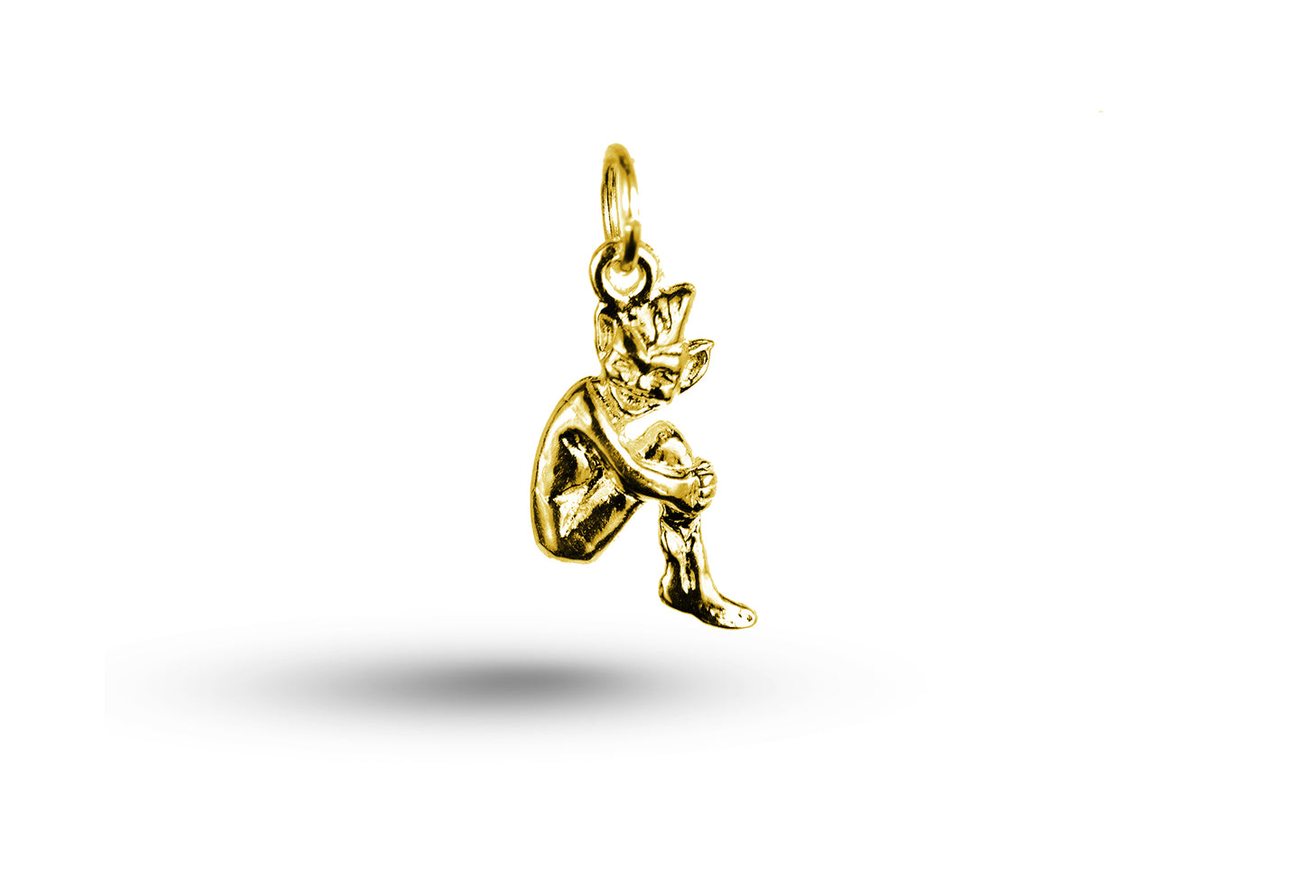 Yellow gold Pixie Sitting charm.