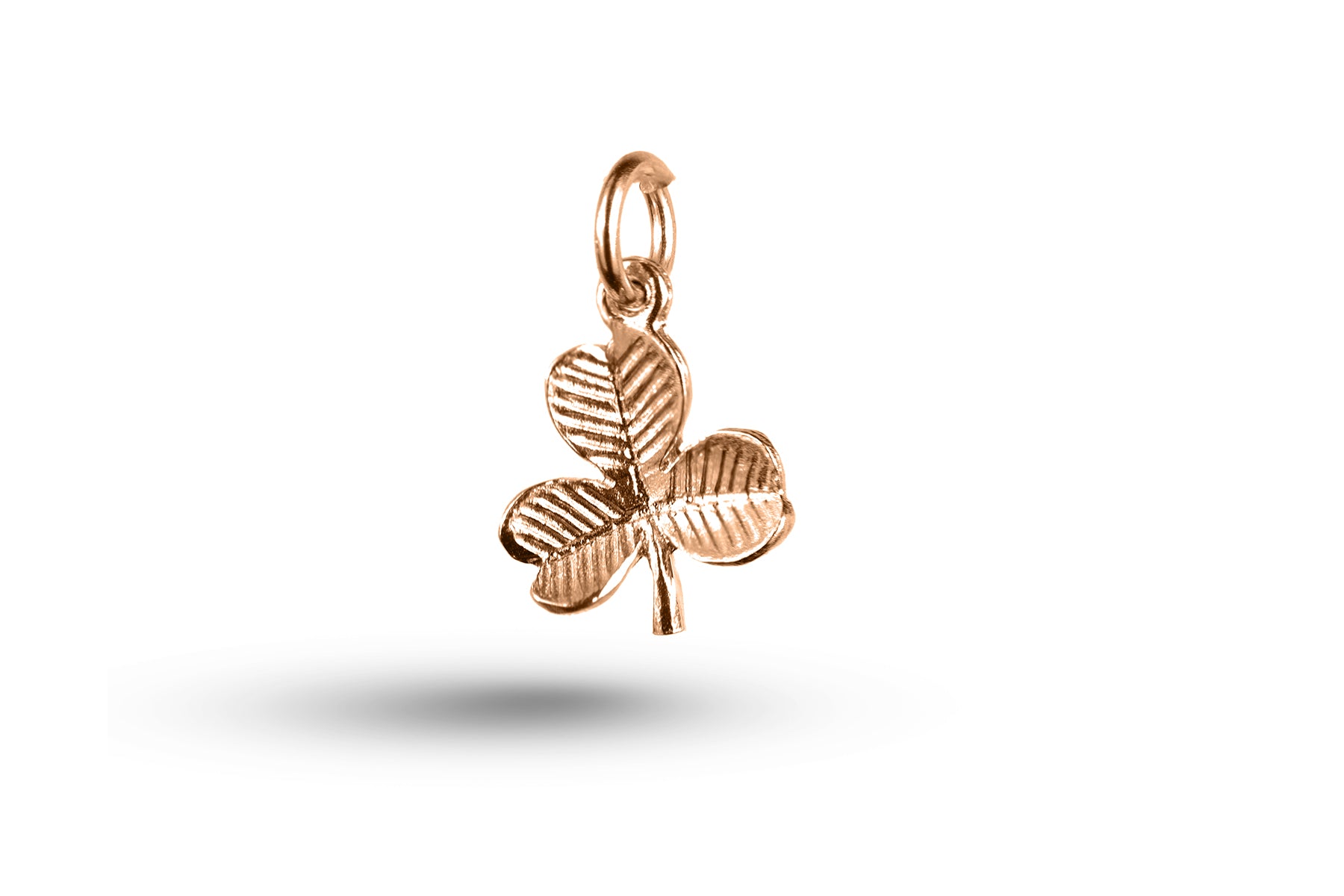 Rose gold Shamrock charm.