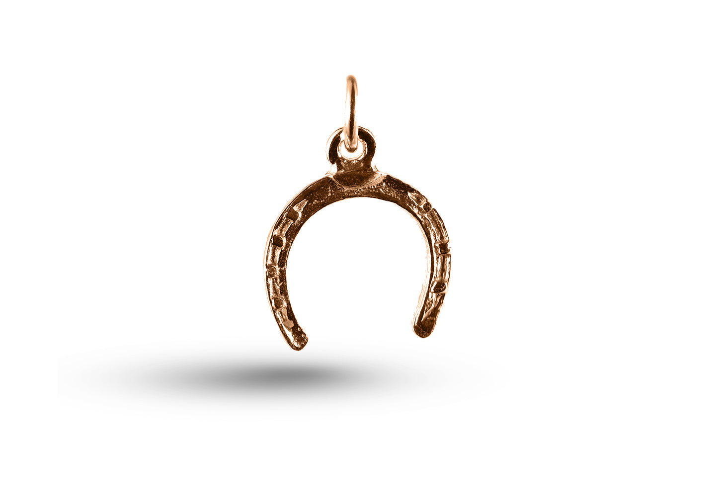 Rose gold Horseshoe charm.