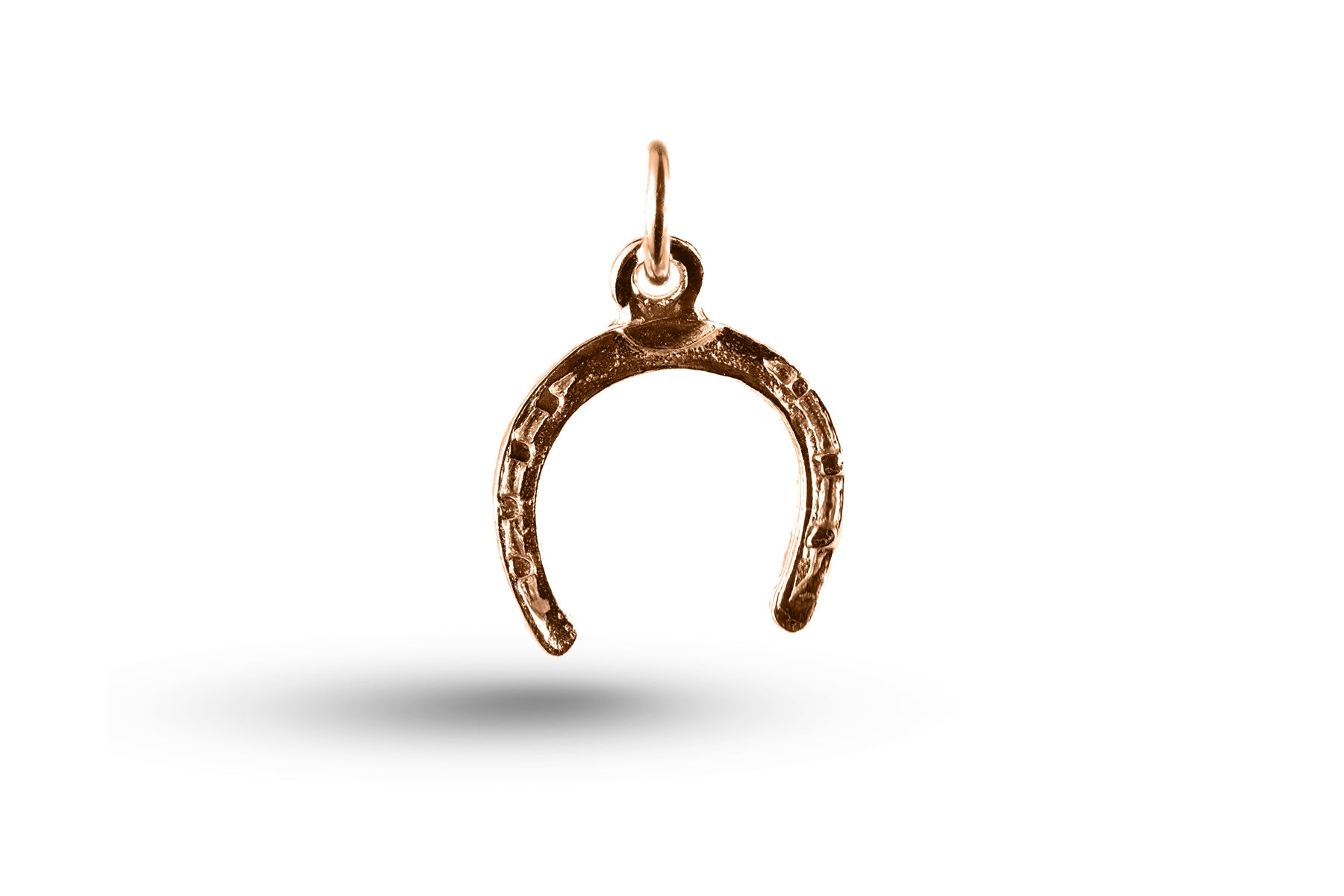 Rose gold Horseshoe charm.