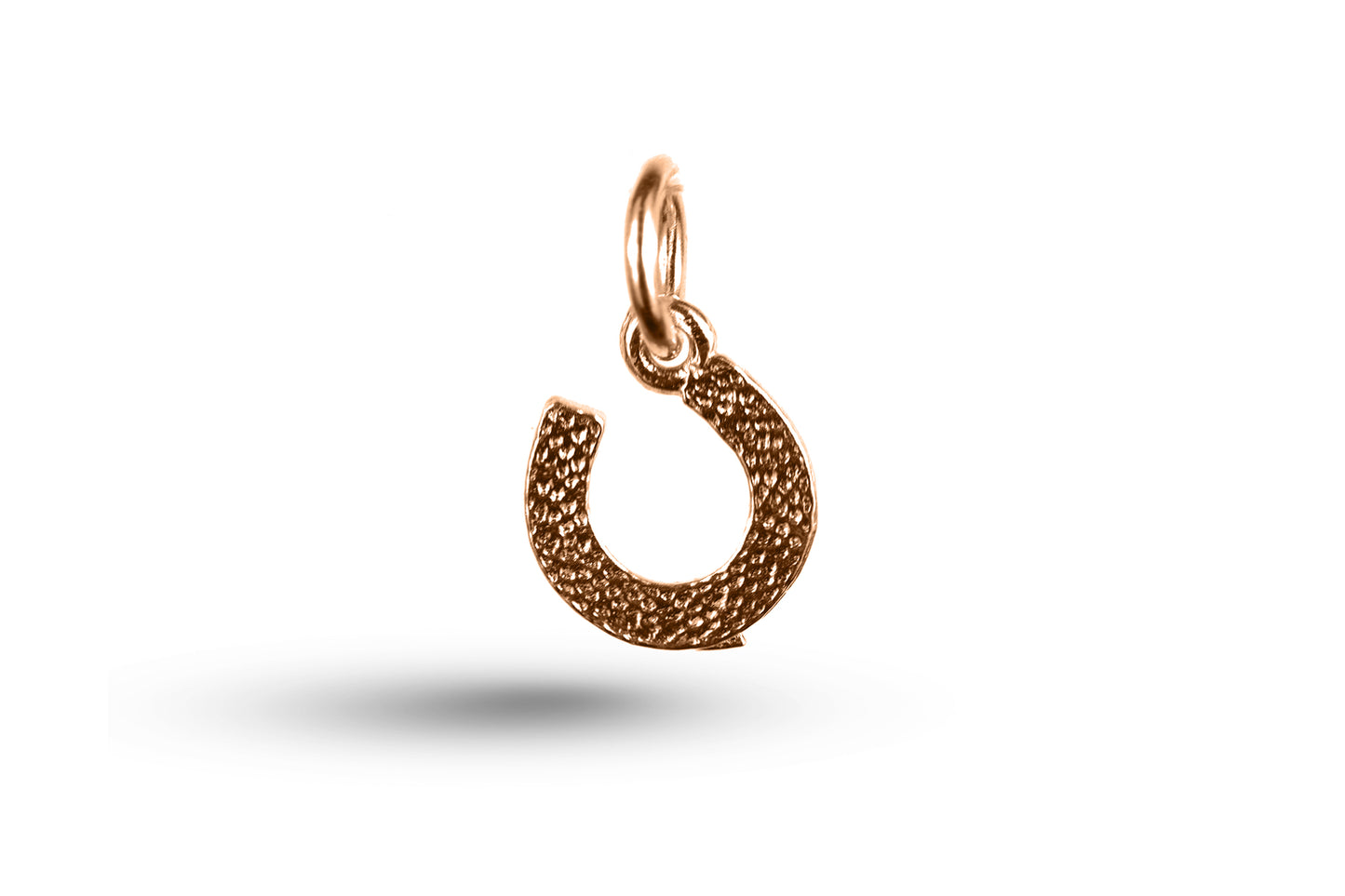 Rose gold Horseshoe charm.