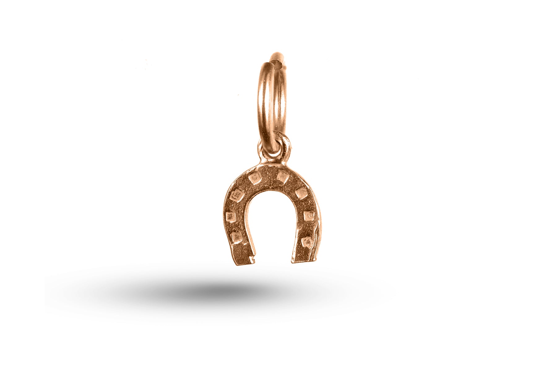 Rose gold Horseshoe charm.