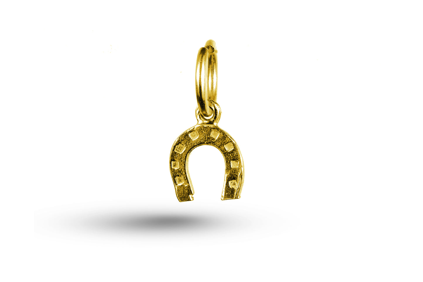 Yellow gold Horseshoe charm.