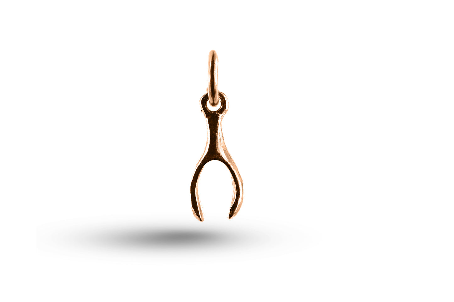 Rose gold Wishbone charm.