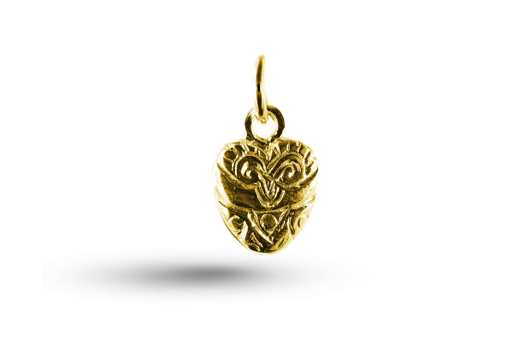 Yellow gold Engraved Heart charm.