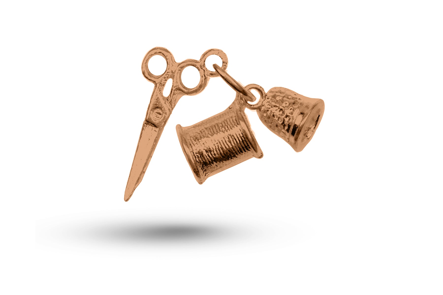Rose gold Sewing Set charm.