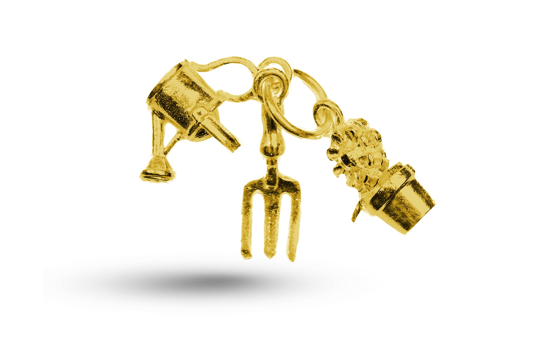 Yellow gold Gardening Set charm.